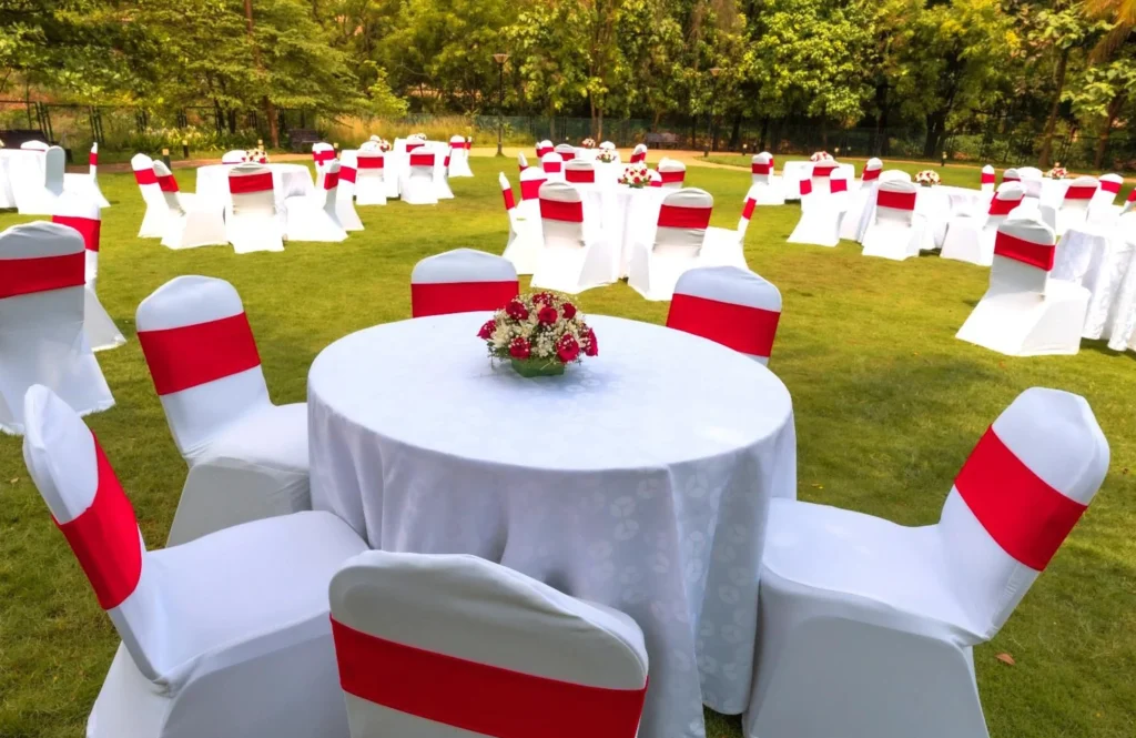 Signature Lawns set with round tables at Signature Club Resort, Devanahalli